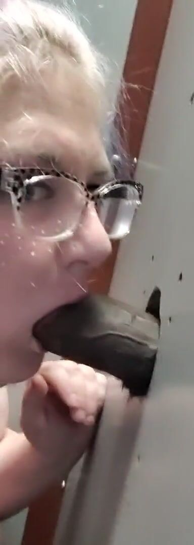 My first BBC blowjob through Glory Hole while my husband was out of town