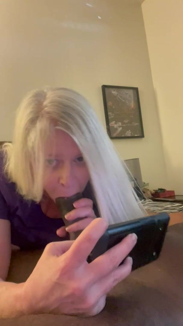 Messaging her husband!